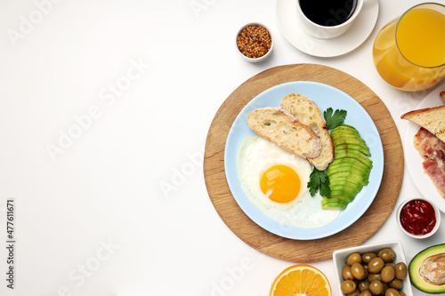 Concept of tasty breakfast on white background