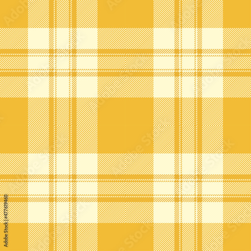 Yellow tartan plaid. Scottish pattern fabric swatch close-up. 