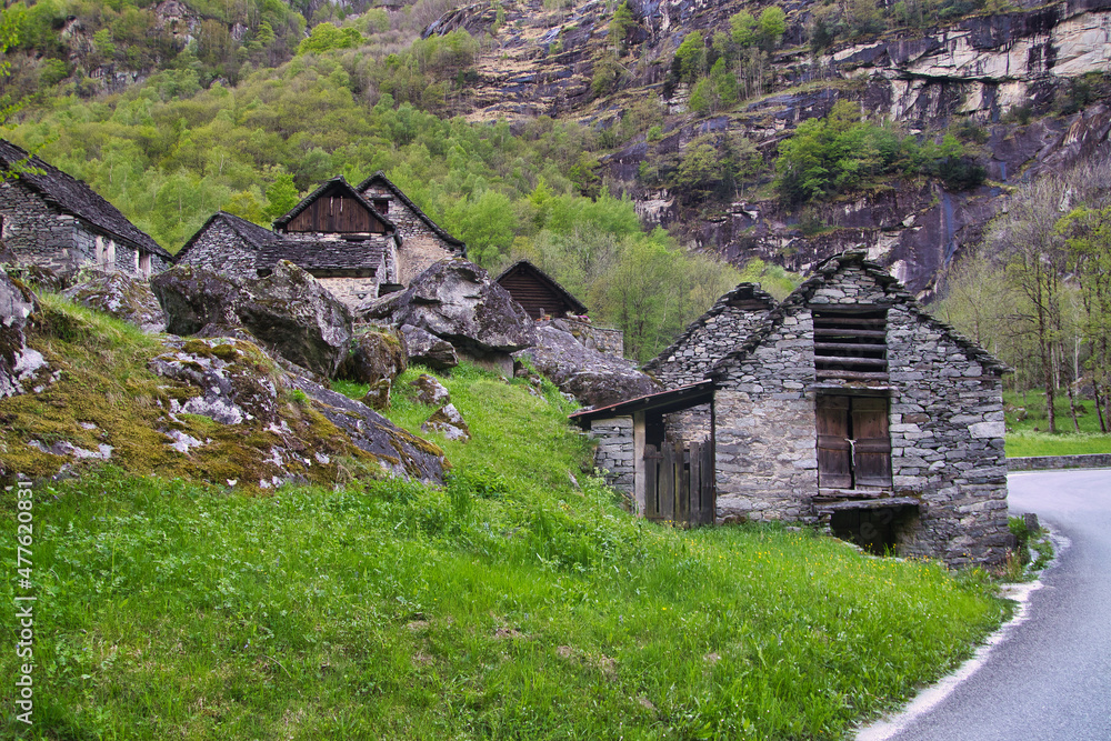Stone houses an Waterfall Val Bavona, Cevio in Switzerland spring 2021