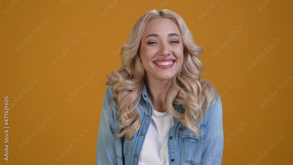 Ecstatic lady fist up scream yeah isolated vivid color background Ecstatic lady fist up scream yeah isolated vivid color background