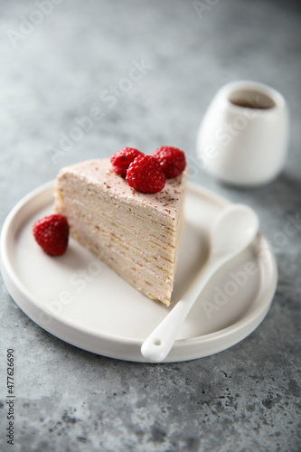 Homemade crepes cake with raspberry cream