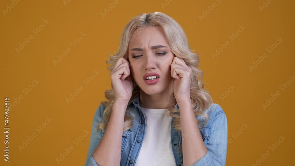 Depressed lady touch head fingers overworked isolated shine color background Depressed lady touch head fingers overworked isolated shine color background