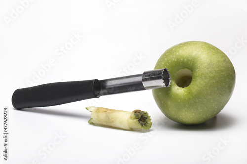 case corer Granny Smith apple white background
