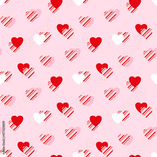 Heart pattern, candy cane, peppermint striped textured hearts seamless background