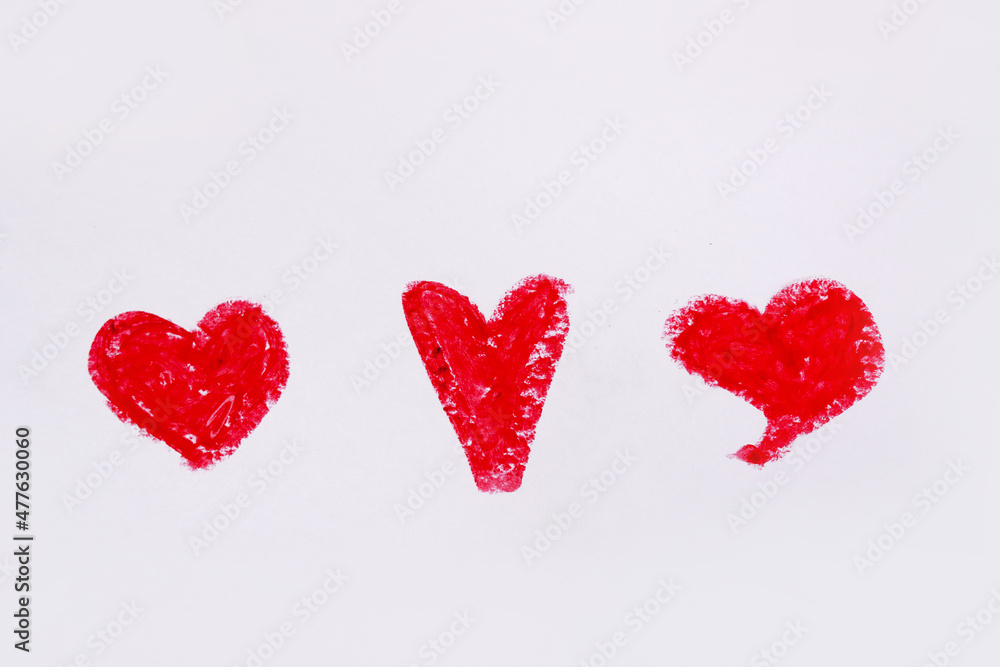 Red color lipstick paint in heart shape isolated on white background Red color lipstick paint in heart shape isolated on white background