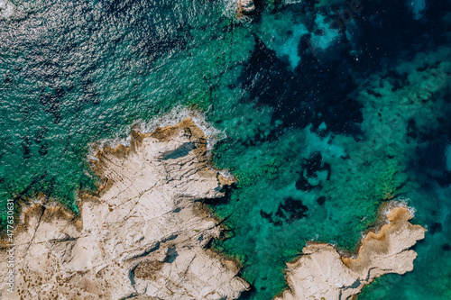 Aerial shot of a drone with crystalline waters of the coast of Frioul islands, Marseille.