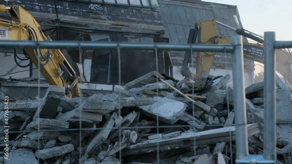 bulldozer dismantles the old building bulldozer dismantles the old building