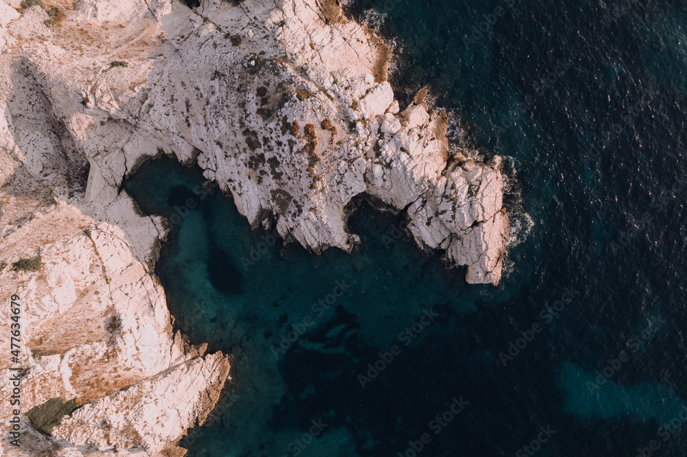 Aerial shot of a drone revealing the crystalline waters in the coast of Frioul islands, Marseille.