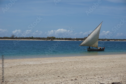 Traditional dhow navigating between Lamu Island and Manda Island