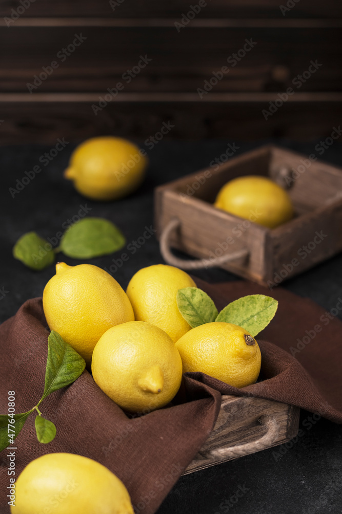 lemons on wooden box