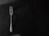 fork on black background for poster