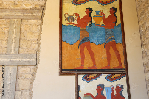 Minoan figures mural painting fresco at archaeological site of Knossos. Minoan Palace , Crete ,Greece photo