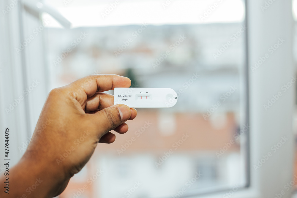 positive selftest result for covid 19 at home Stock Photo Adobe Stock