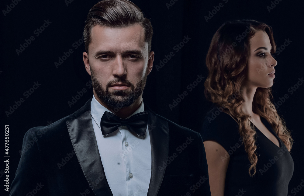 gentleman with his girl posing in the studio gentleman with his girl posing in the studio
