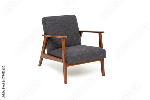 Vintage arm chair with wood armrests, armchair with solid wood frame construction on white background photo