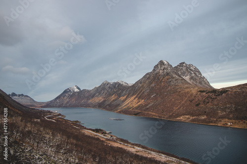 View of the bay with the village of Gryllefjord in the Andsfjord area on the Senja peninsula in northern Norway. Scandinavian landscape photo