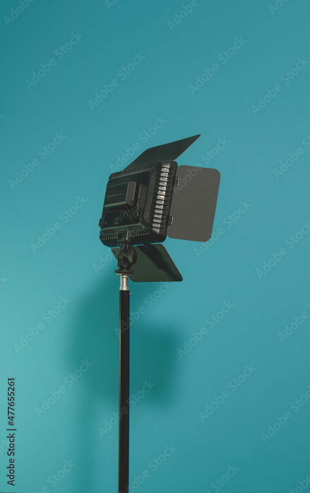 lighting device for video and photo shooting. On a blue background. vertical lighting device for video and photo shooting. On a blue background. vertical