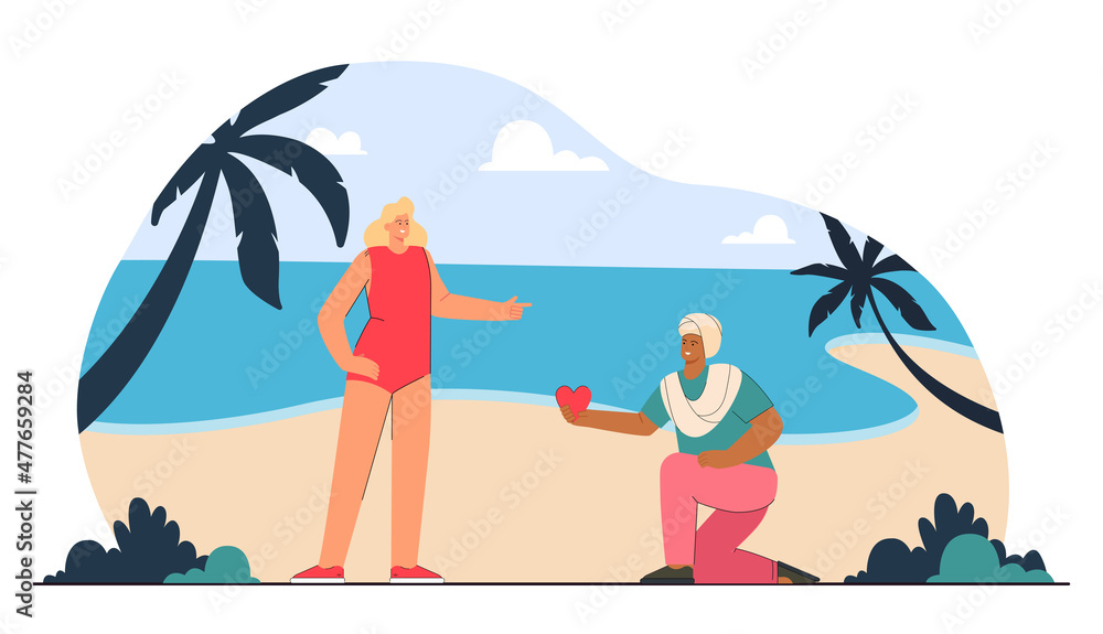 Indian man on one knee offering red heart to blond woman in swimsuit on seashore. Vacation romance flat vector illustration. Love, relationship concept for banner, website design or landing web page