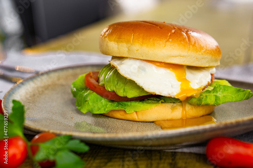 Egg and Avocado Bun Sandwich. English breakfast.