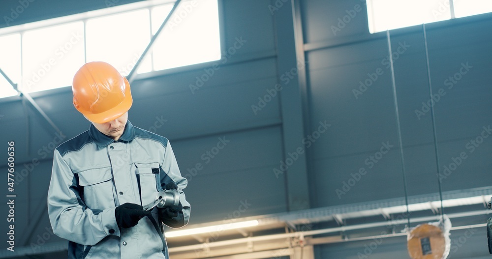 technician worker hands measuring detail tool after processing at workshop with sliding caliper at manufacturing. technician worker hands measuring detail tool after processing at workshop with sliding caliper at manufacturing.