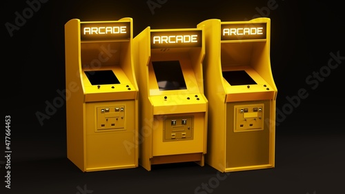 Three Yellow Arcade Machines