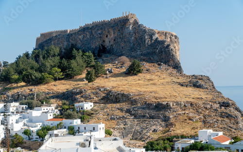 View of the Rock of Lindos complete with city, theater and Acropolis. Rhodes Island.