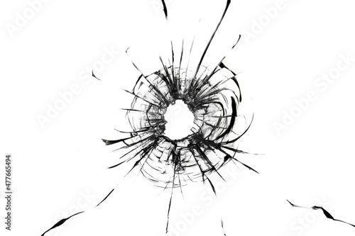 Broken glass, the texture of cracks from a shot through a bullet window. Cracked abstraction on a white background.