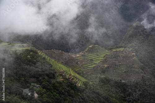 Views of Macchu Pichu through the mist and the surrounding mountains, Peru © Katherine
