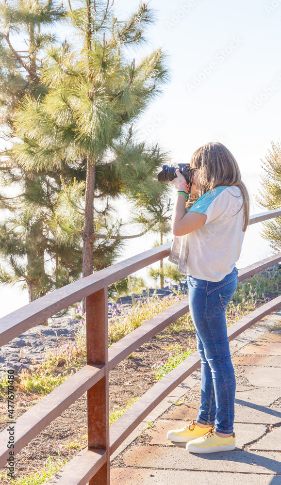 Young girl taking pictures Young girl taking pictures