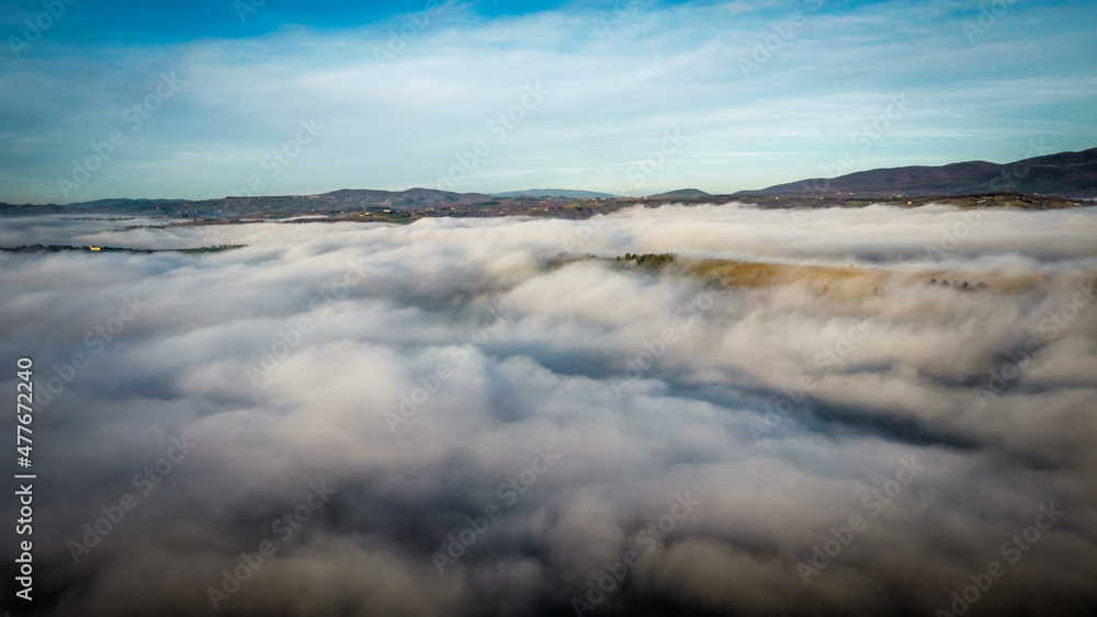 Layers of fog color a winter day