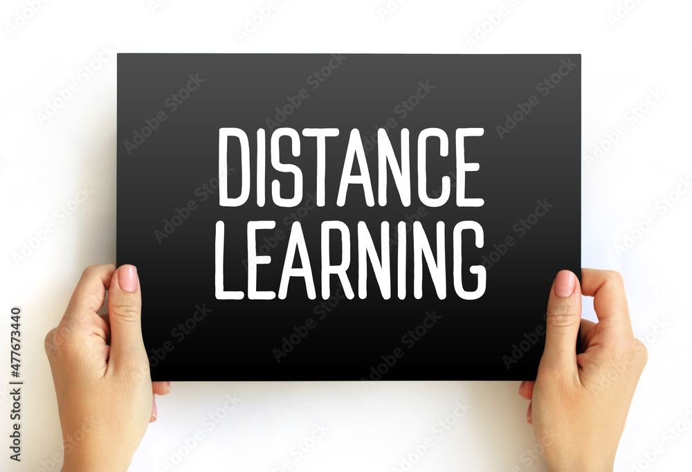 Distance learning - education of students who may not always be physically present at a school, text on card concept background Distance learning - education of students who may not always be physically present at a school, text on card concept background