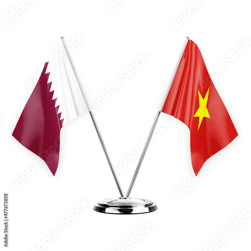 Two table flags isolated on white background 3d illustration, qatar and vietnam