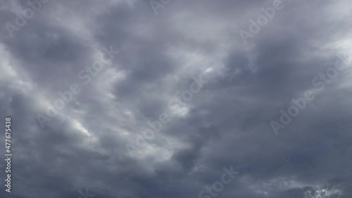 The cloudy sky timelapse shows the rain clouds forming gray and it's about to rain soon. Bong tells the passage of time or tasks related to storms or the atmosphere and rain clouds.