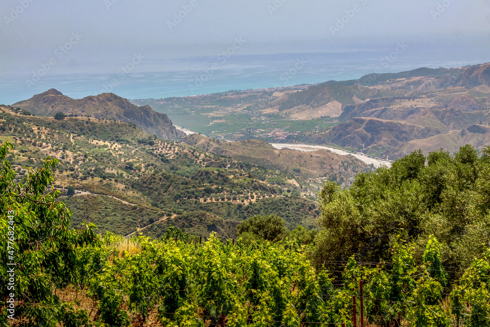 Wild and picturesque Calabria
Amazing scenery of Calabrian hills with roads and olive trees visible from Bova superiore. Calabria, Italy