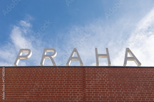 Big letters praha Prague on the wall on bus hub Florenc. Czechia destination in Europe. photo