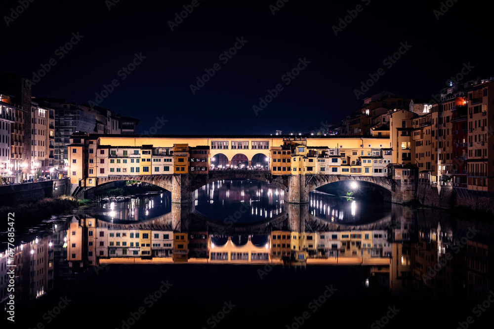 Ponte Vecchio Florence at night, Firenze Italy, river Arno reflection