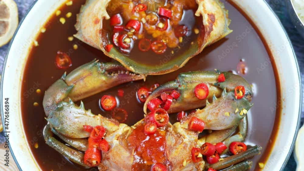 Korean Soy Sauce Pickled Crab, Fresh raw crabs marinated in a mild soy