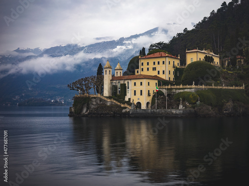 Vibrant buildings on the edge of the shore of Lake Como in Italy during the winter/spring months.
