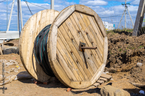 installation and protection of temporary cable providing electricity to the construction site large cable reel