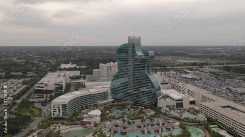 Orbiting aerial of dramatic architecture of Seminole Hard Rock Hotel