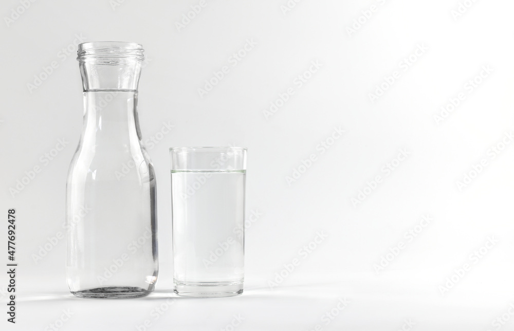 Water glass and bottle on a white background Water glass and bottle on a white background