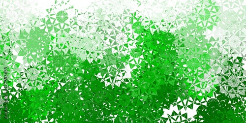 Light green vector background with christmas snowflakes. © Guskova