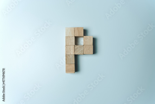 Letter P from wooden dice White Background