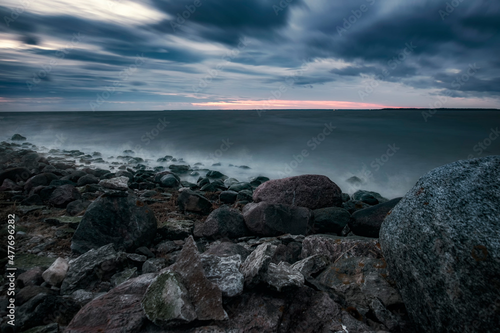 mystical foggy sea and rocky shore in the evening mystical foggy sea and rocky shore in the evening