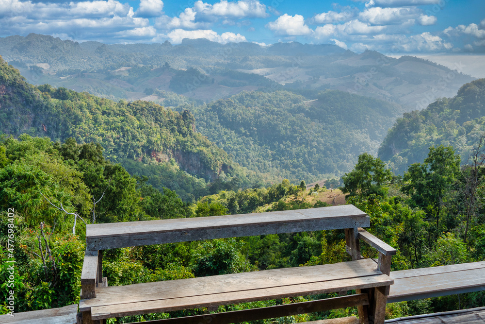 Bench and View of Mountains from Ban Jabo Village in Northern Thailand Bench and View of Mountains from Ban Jabo Village in Northern Thailand