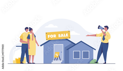 Young couple buying new house. Happy woman and man standing in front of house.