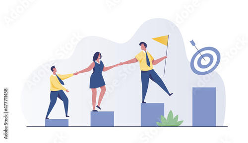 Teamwork success - Team of business people walking up staircase, holding hands with raised flag.