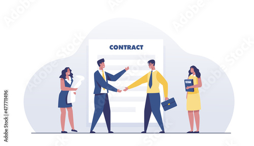 Agreement. Business people shaking hands in front of a contract.