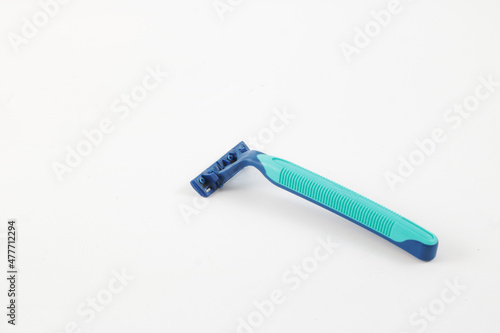 A small blue razor to shave beard.