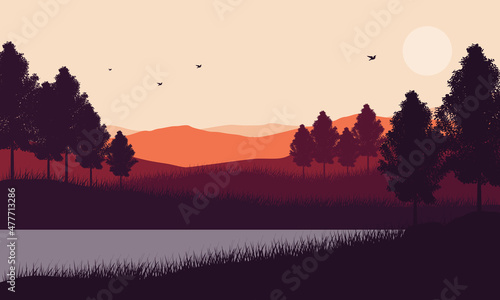 view of the mountain in the daytime with lush pine trees next to the cliff